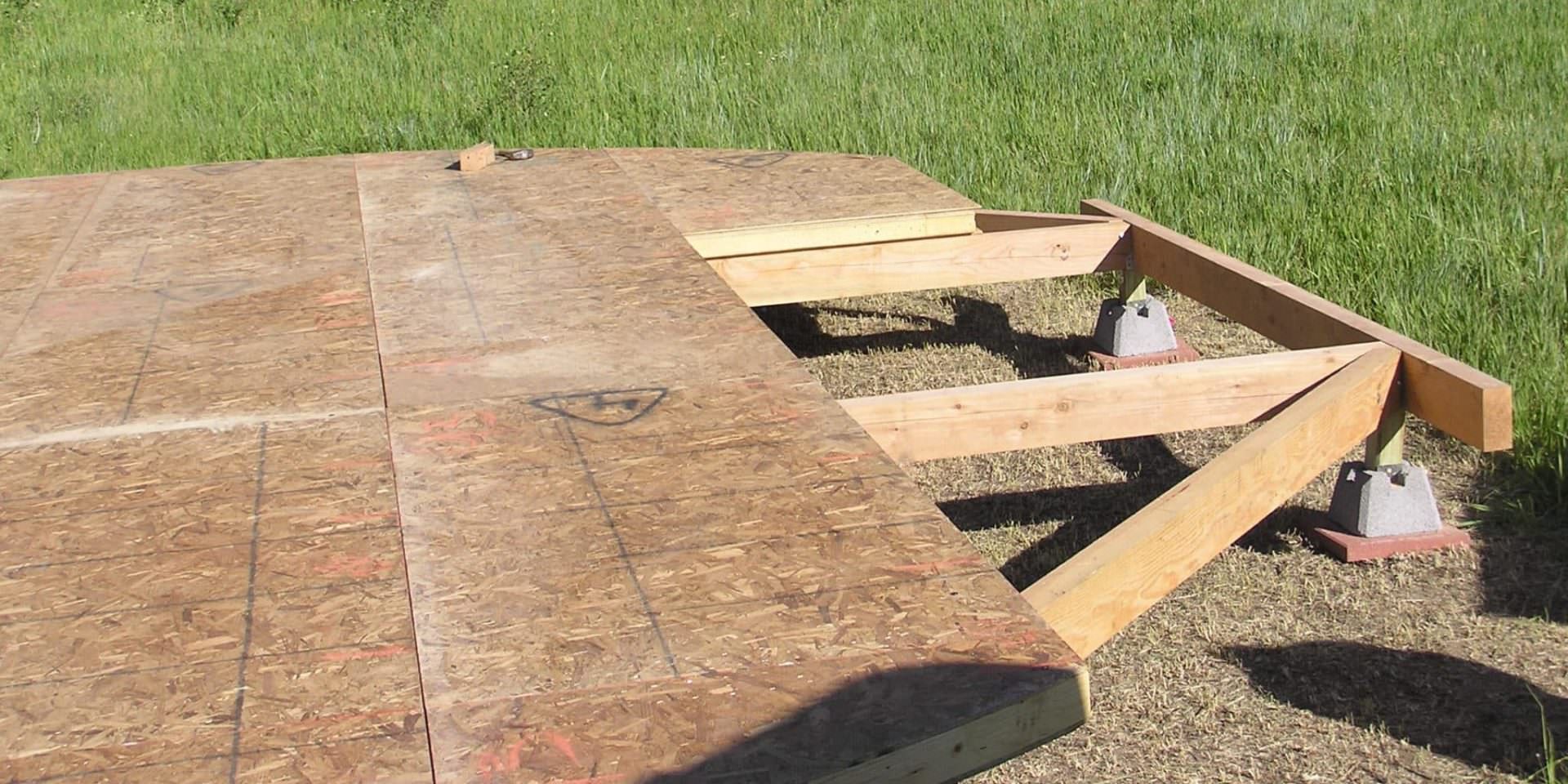 SIPs structural insulated panel deck on a wooden frame