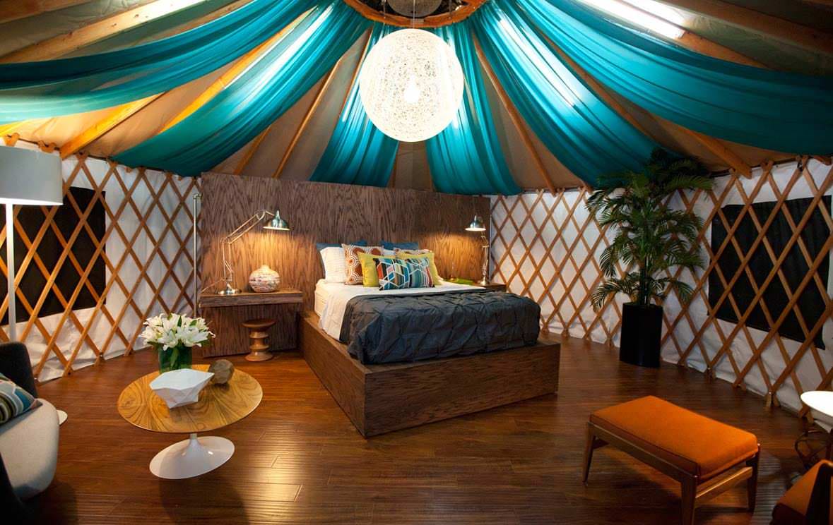 HGTV-featured yurt bedroom suite with king bed and exposed rafters